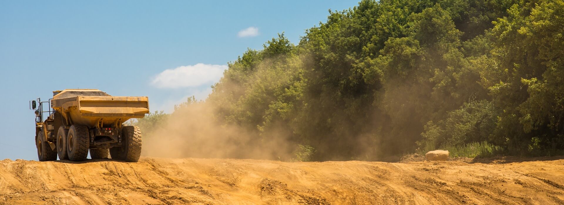 Construction equipment developing land