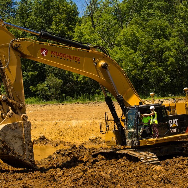Construction equipment developing land
